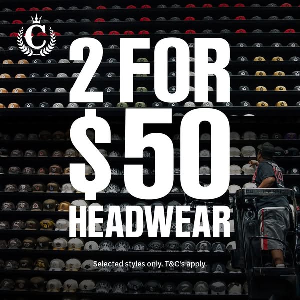 This image ad promotes a deal from an apparel retailer, offering any two headwear items for $50. The ad is set in a stor