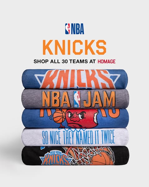 This ad features a stack of New York Knicks t-shirts sold by Homage. It is geared toward fans of the New York Knicks bas