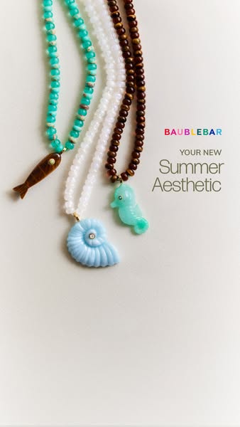 This image ad showcases three necklaces with different beaded strands and sea creature pendants. The ad promotes the bra