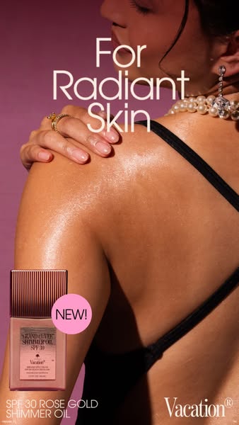 This image ad is for Vacation brand's SPF 30 Rose Gold Shimmer Oil. The ad showcases a woman's shoulder and back