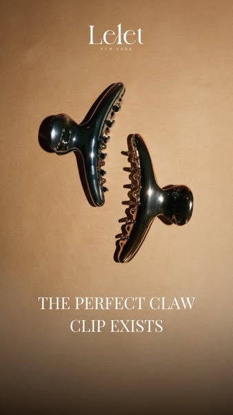 This ad features a close up shot of two hair clips. The hair clips are presented in a way that shows how fashionable and