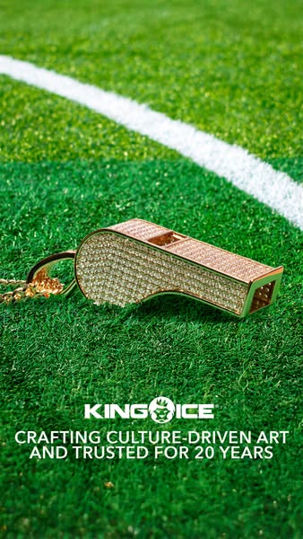 This ad from King Ice showcases a diamond-encrusted gold whistle pendant against the backdrop of a football field, blend