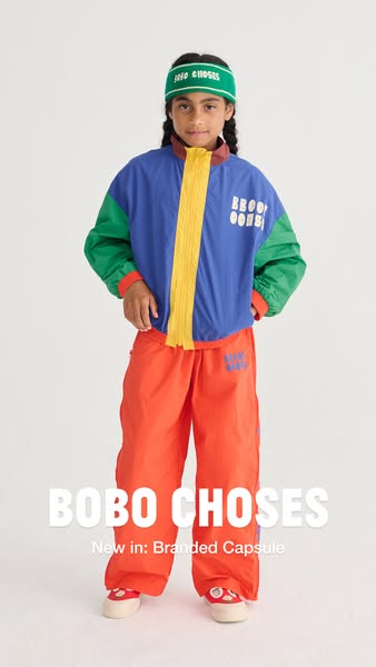 This ad showcases a child model wearing a colorful matching athletic set with the Bobo Choses brand logo. The creative i