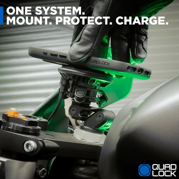 This ad showcases Quad Lock's phone mounting system, emphasizing its ability to mount, protect, and charge your phon