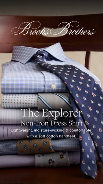 This ad showcases Brooks Brothers dress shirts. The shirts are neatly stacked, with a tie draped over them, emphasizing 