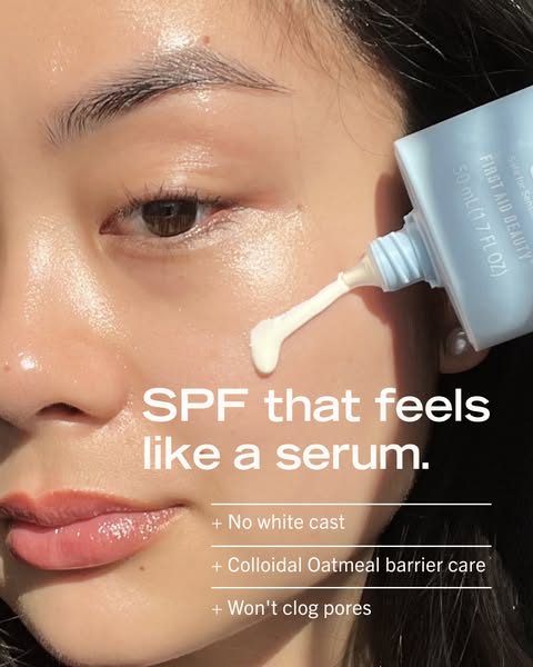 This ad for First Aid Beauty features a light-skinned woman applying the brand's SPF product to her face. The ad hig