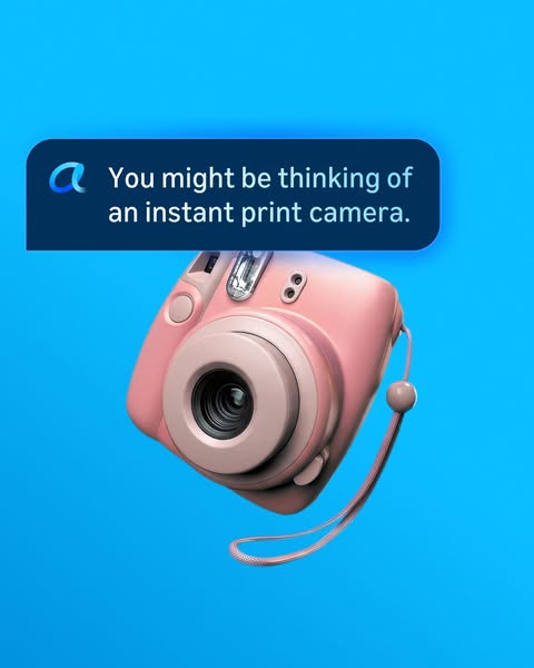 This ad shows a pink camera. The text suggests the viewer might think of it as an instant print camera, but implies ther