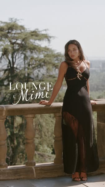 This ad features a woman wearing a black dress from Lounge Underwear's collaboration with Mimi. She is standing on a