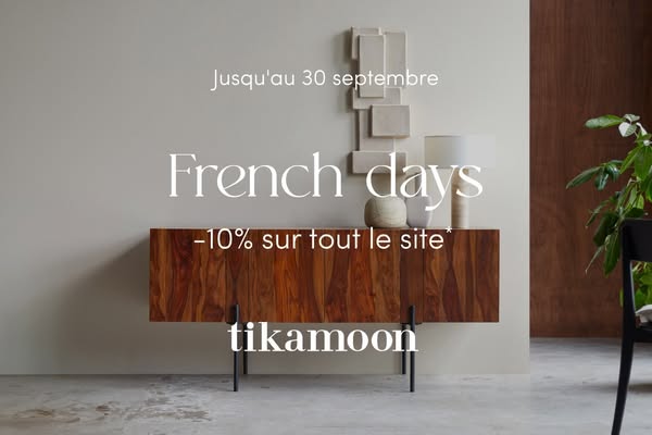The ad showcases a wooden credenza with dark metal legs, styled with neutral decor. The image also promotes an offer for