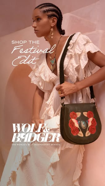 This image ad for Wolf & Badger showcases their new festival edit, featuring a model in a white dress and a decorate