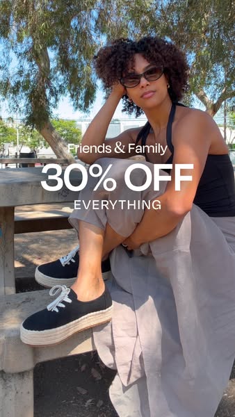 This ad features a woman sitting on a concrete structure with a tree in the background promoting 30% off everything duri
