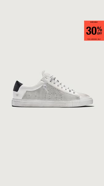 This ad features a single white and gray sneaker on a beige background, with a red badge in the top right advertising a 