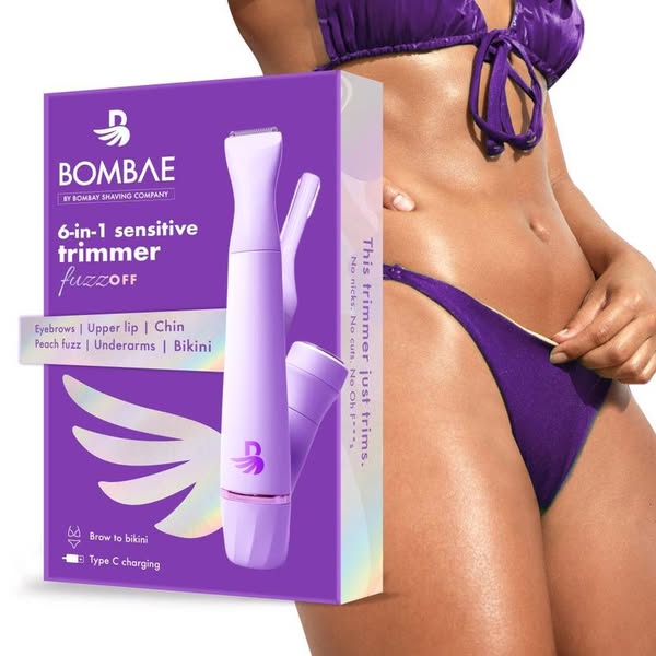 This image ad showcases the Bombae 6-in-1 Sensitive Trimmer in front of a woman who is wearing a bikini.