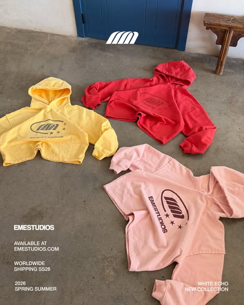 Ad showcases three different-colored cropped hoodies from EMESUTDIOS new collection "White Echo". The ad highl