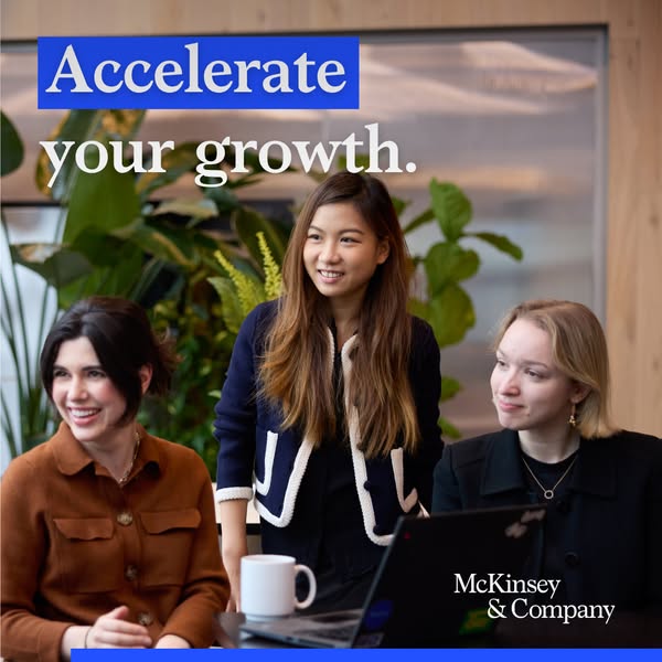 This ad features a photo of three women in a professional office environment, with the text overlay 'Accelerate your
