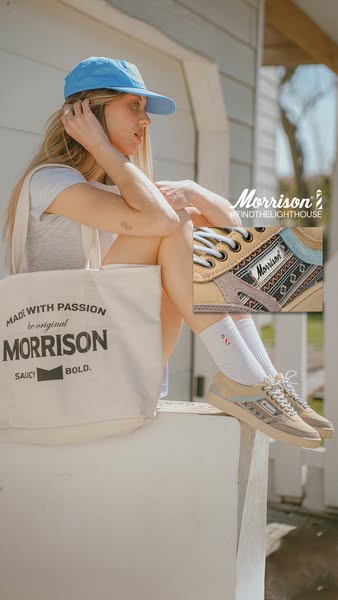 This ad showcases a person sitting on a ledge wearing Morrison brand shoes, socks, and hat. A Morrison brand tote bag le