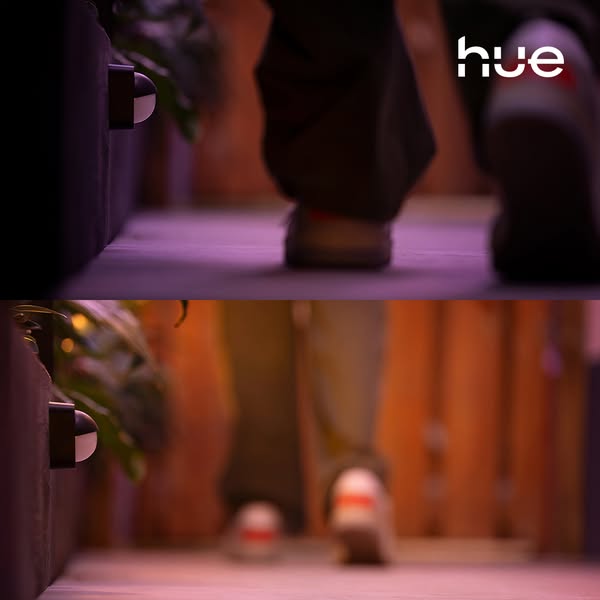 This split screen ad shows a walkway before and after being illuminated by Philips Hue outdoor lights. The top half of t