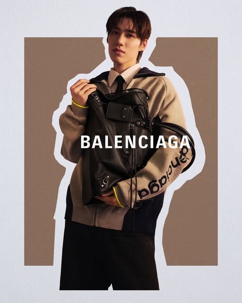 This ad features a full shot of a man holding a black leather bag with the brand's name overlaid on the image.